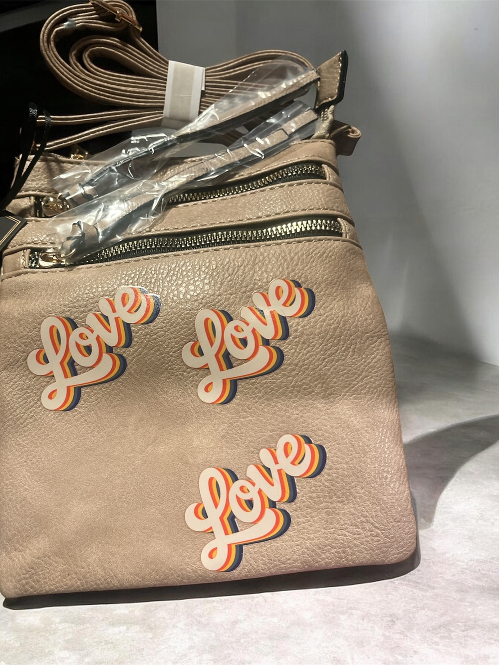 Beige Women’s Crossbody Bag with 'Love' Graphic Accents